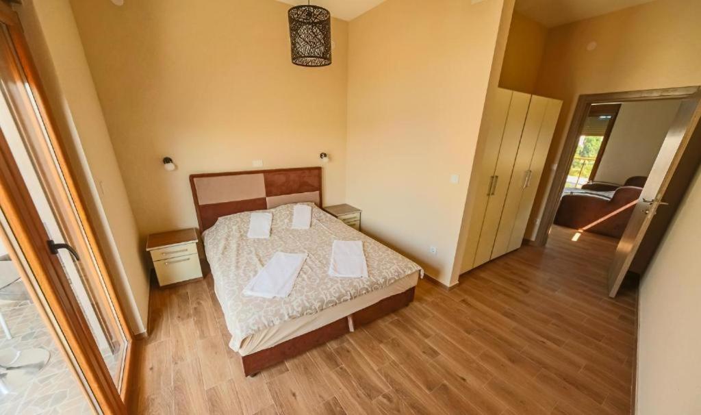 Vuode tai vuoteita majoituspaikassa Apart Hotel XXL Lux
