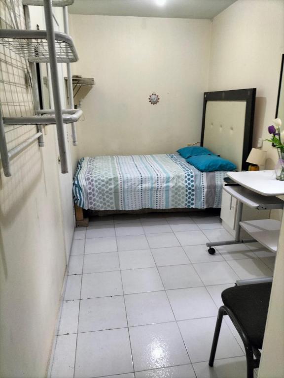 Postel nebo postele na pokoji v ubytování Hotel Teui Formarte