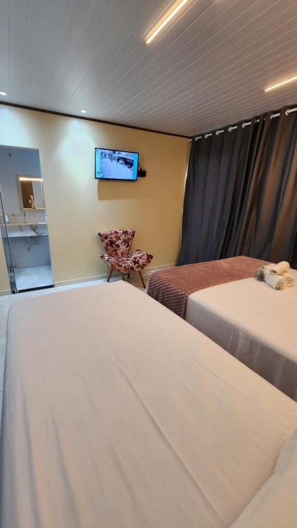 Postel nebo postele na pokoji v ubytování Flats Bahia