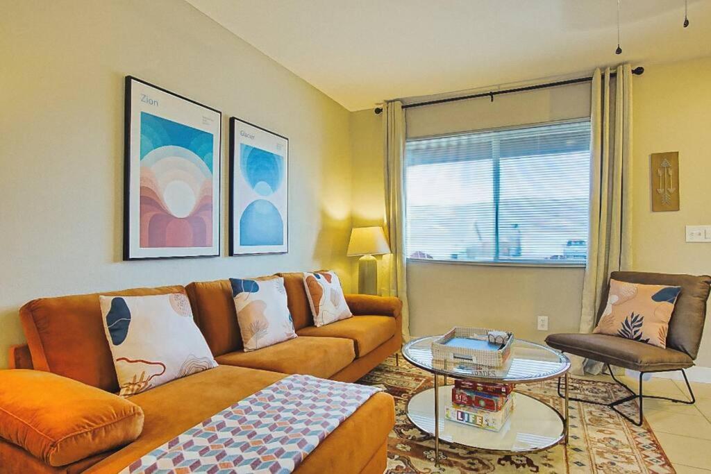 a living room with a couch and a table at Nightsky Nest ※ Desert Getaway by Joshua Tree Park in Twentynine Palms