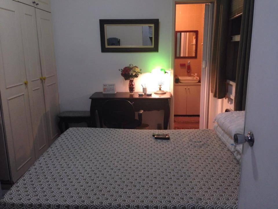 Cama o camas de una habitación en Super Quarto Copacabana/Ipanema