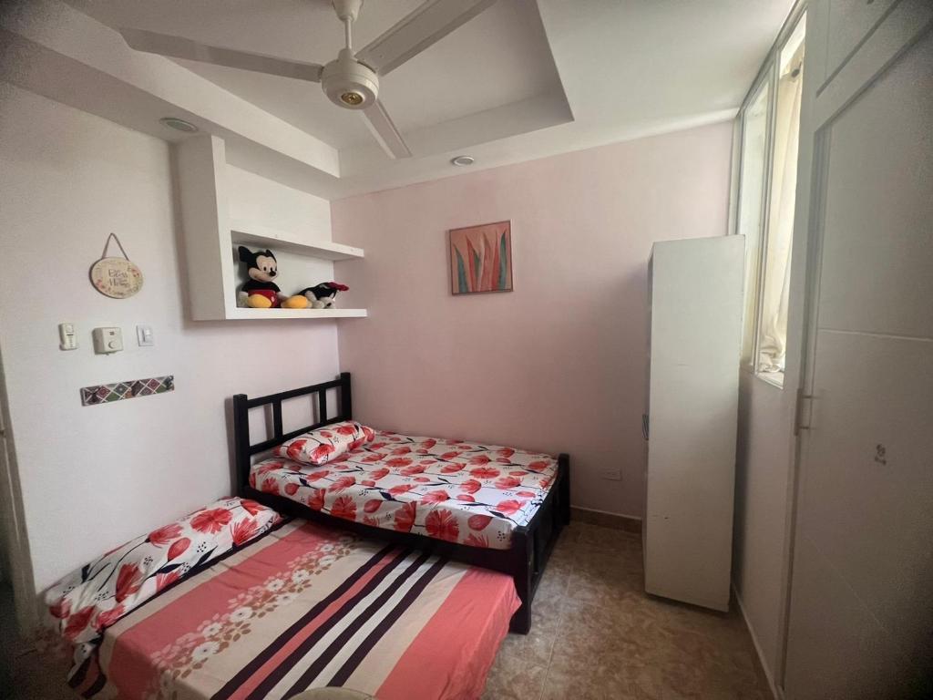 Ένα ή περισσότερα κρεβάτια σε δωμάτιο στο Casa turistica Montes