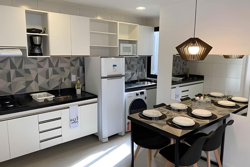 Kuchyň nebo kuchyňský kout v ubytování Hosts BR - Apartamentos funcionais