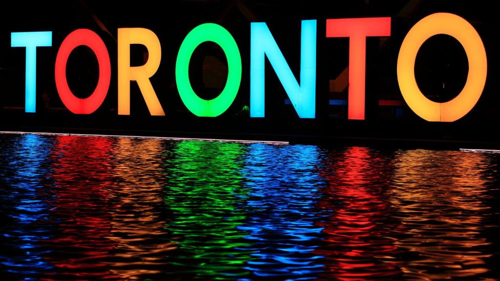 a sign with the word toronto on top of water at Holiday Inn Express Toronto Downtown, an IHG Hotel in Toronto