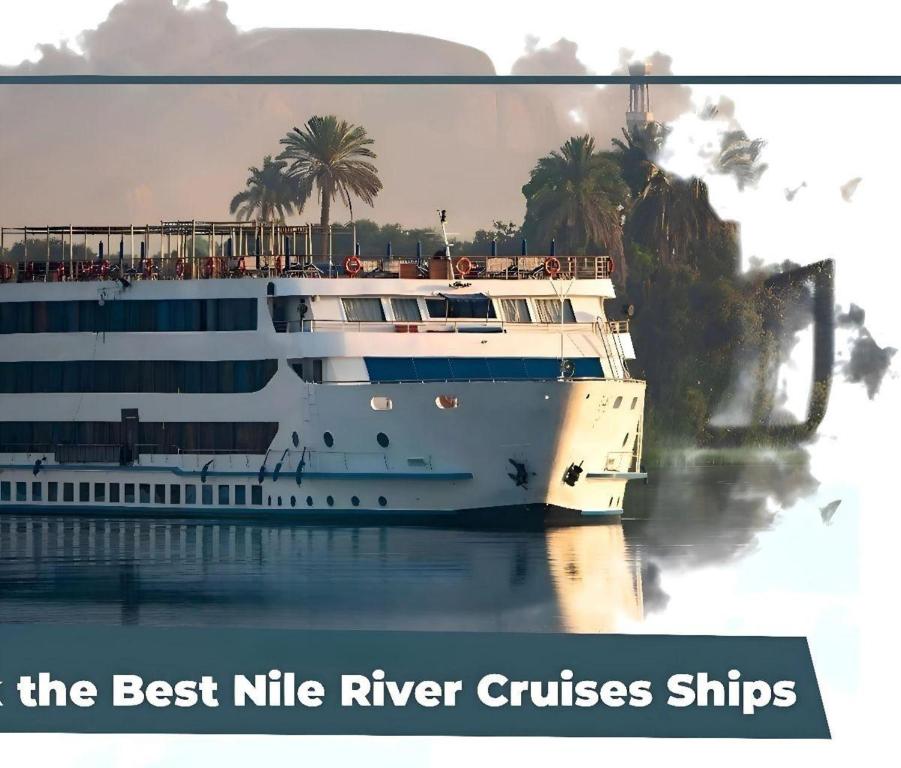 a cruise ship is docked in the water at NILE CRUISE ULTRA DELUXE in Aswan