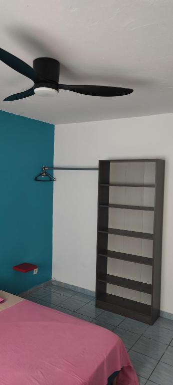 Postel nebo postele na pokoji v ubytování Le petit cactus