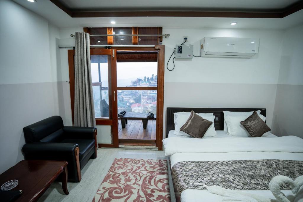 Postel nebo postele na pokoji v ubytování 2K HOTEL