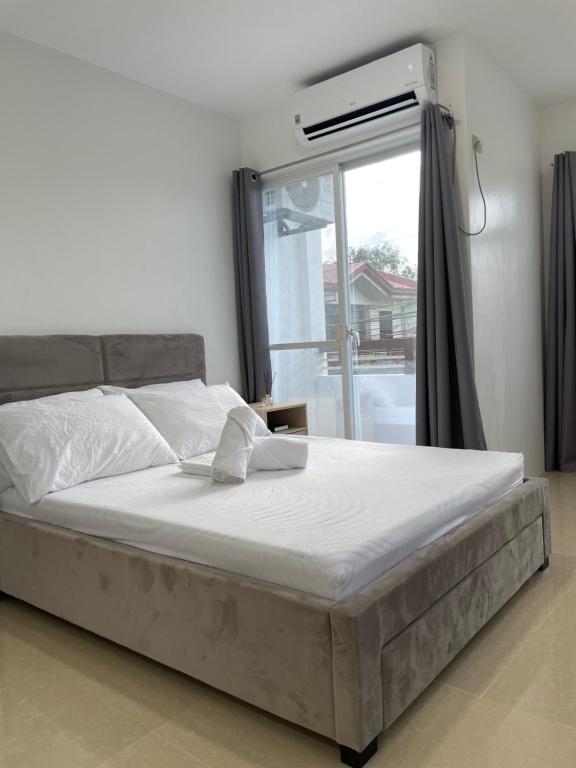Un pat sau paturi într-o cameră la Chan One Corner