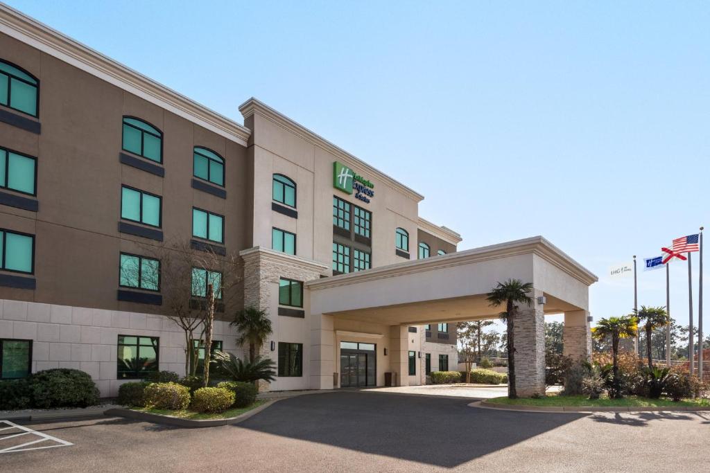 a rendering of the front of a hotel at Holiday Inn Express & Suites Mobile West I-10, an IHG Hotel in Tillmans Corner
