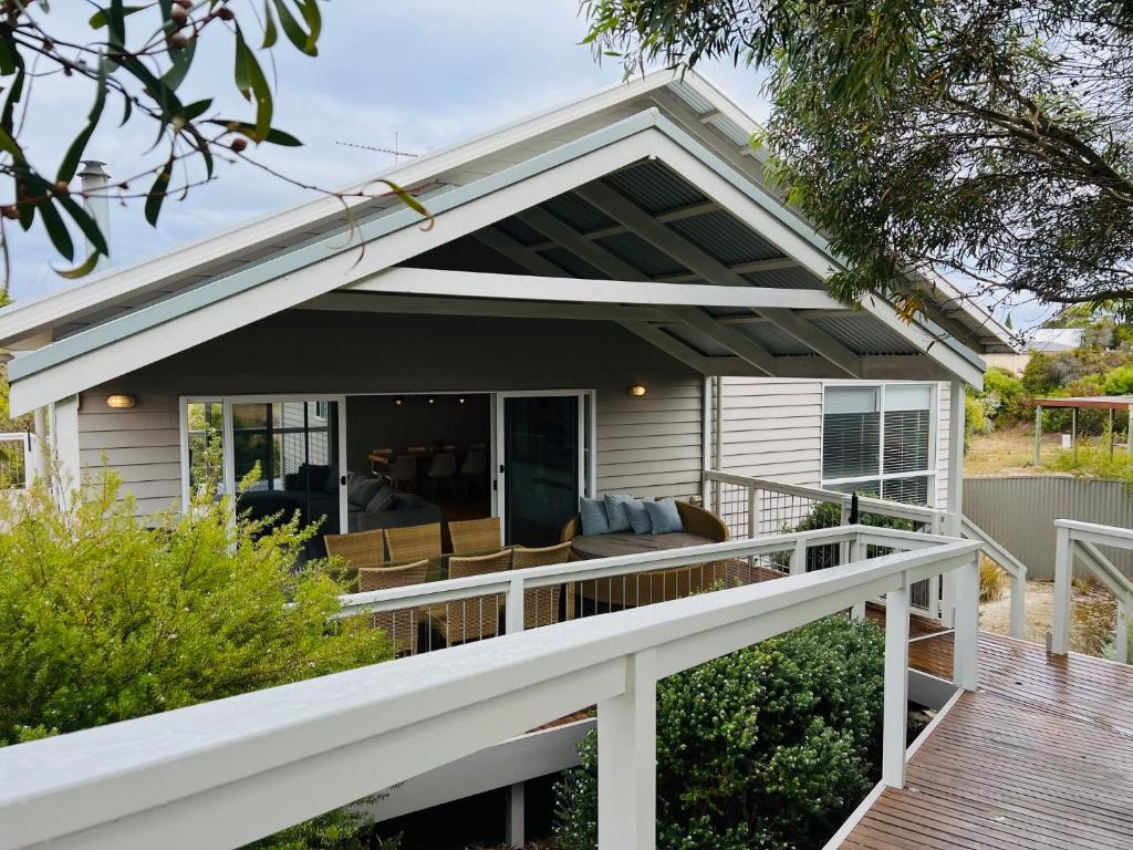 a home with a porch with a deck at Salt Life - Pet Friendly Outside WIFI in Robe