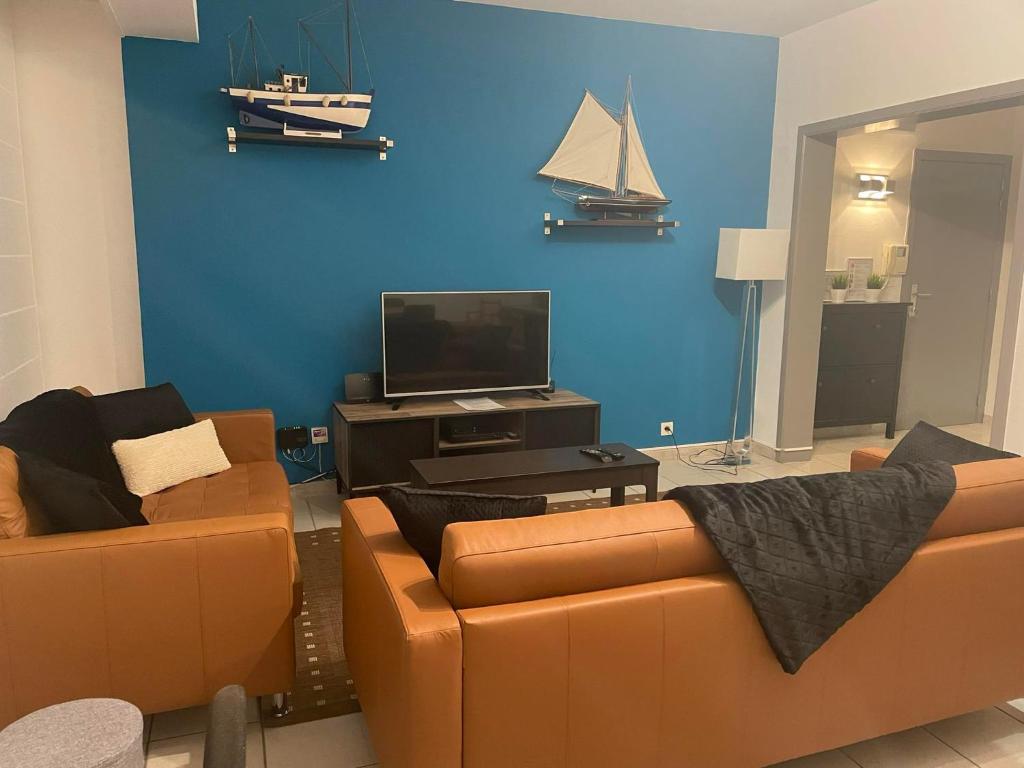 TV a/nebo společenská místnost v ubytování Residentie Paola