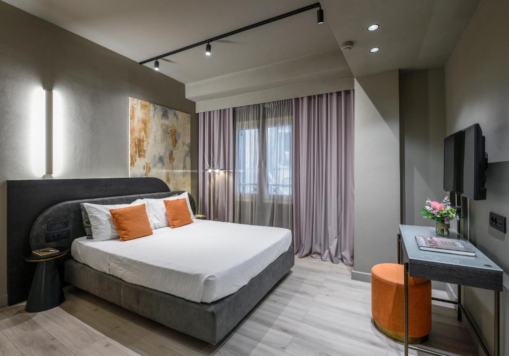 Voodi või voodid majutusasutuse Arcadion Hotel toas