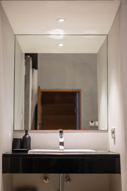 Koupelna v ubytování Woodstory Boutique Hotel