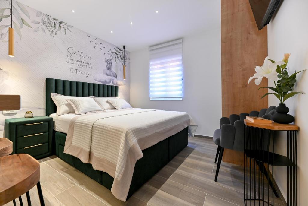 Posteľ alebo postele v izbe v ubytovaní Apartments and Rooms Nekic