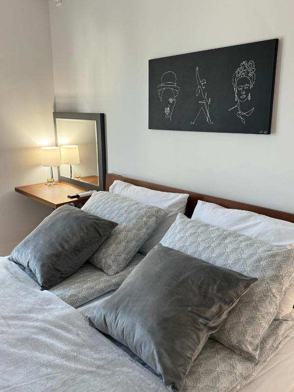 Postel nebo postele na pokoji v ubytování Apartmani Viver Vrnjačka Banja