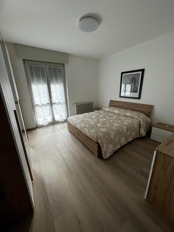 Postel nebo postele na pokoji v ubytování Appartamento G.A.