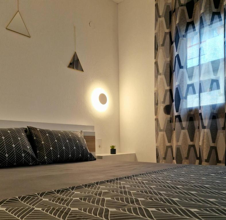 Postel nebo postele na pokoji v ubytování Sky Room 3