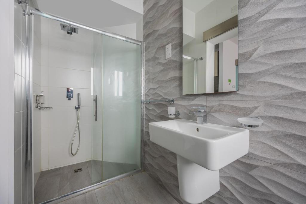 Koupelna v ubytování Jules Suites