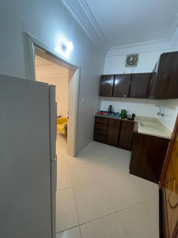 A kitchen or kitchenette at One Bedroom Apartment in Kuday 1