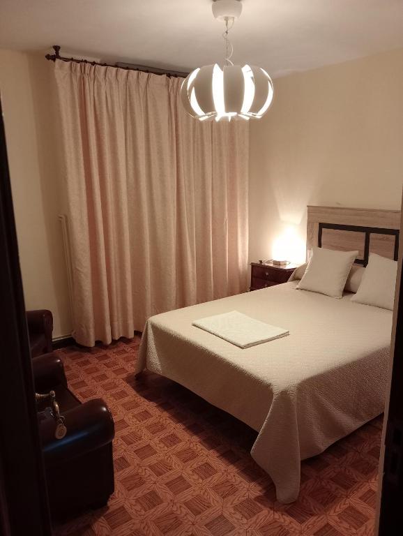 A bed or beds in a room at Habitacion matrimonial centro ciudad
