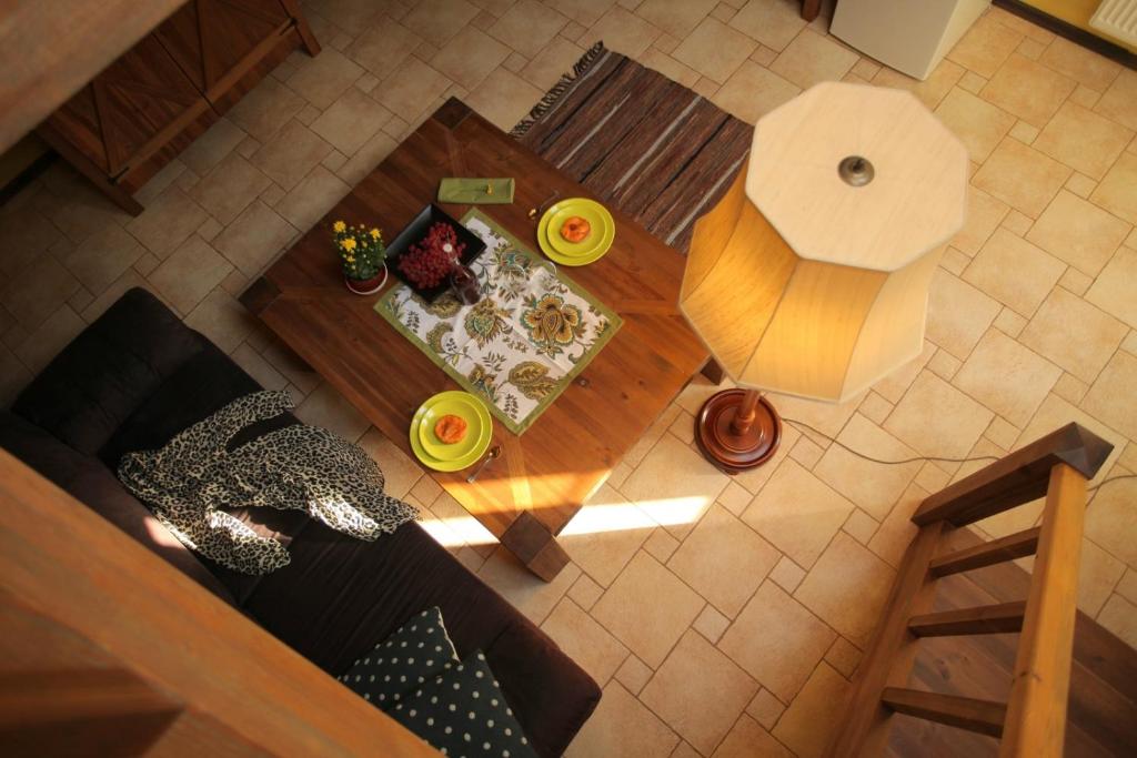 an overhead view of a living room with a coffee table at Ķērpji in Ulmale