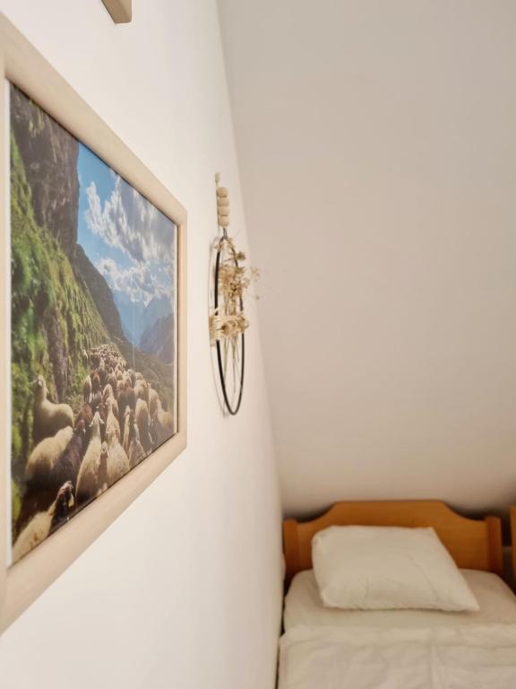 Postel nebo postele na pokoji v ubytování Apartmaji pri Ticelnu