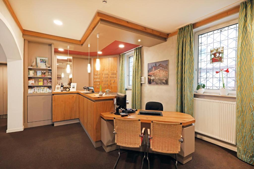 Kuchyň nebo kuchyňský kout v ubytování Hotel Wilder Mann