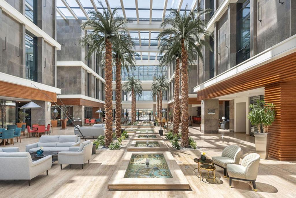 Posezení v ubytování Rixos Premium Alamein