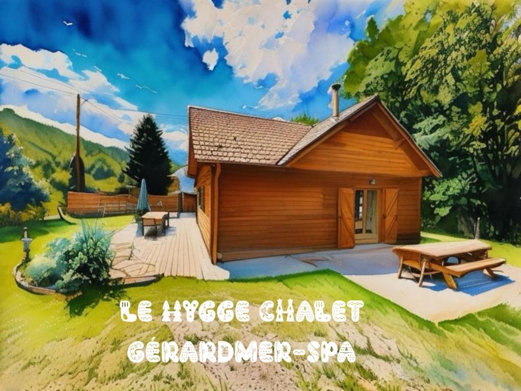 ein Gemälde eines kleinen Hauses mit einem Picknicktisch in der Unterkunft Le Hygge Chalet Gérardmer-Spa in Anould