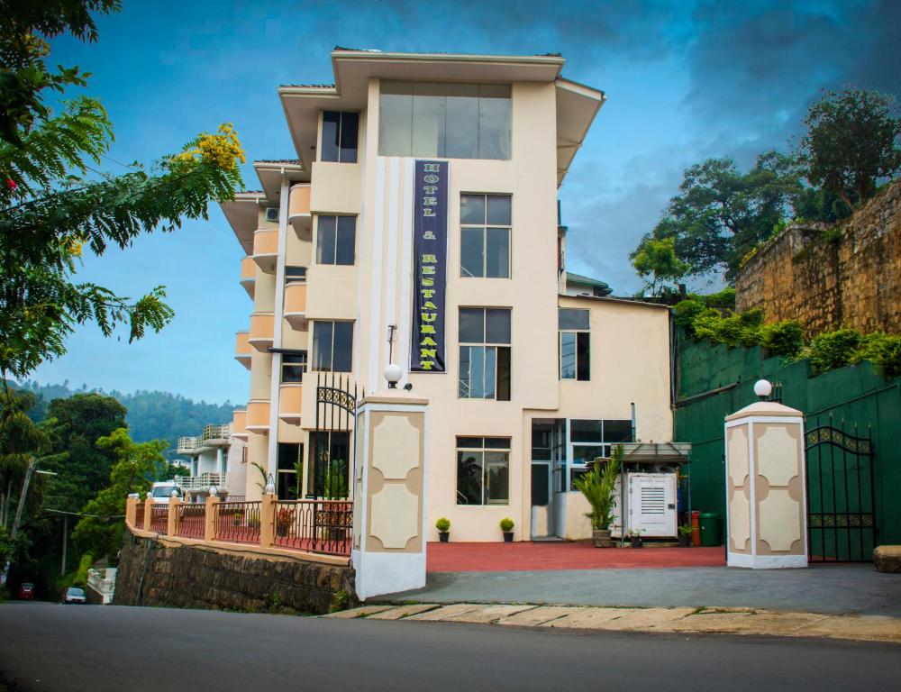 a building on the side of a street at Hotel Lakefield in Kandy