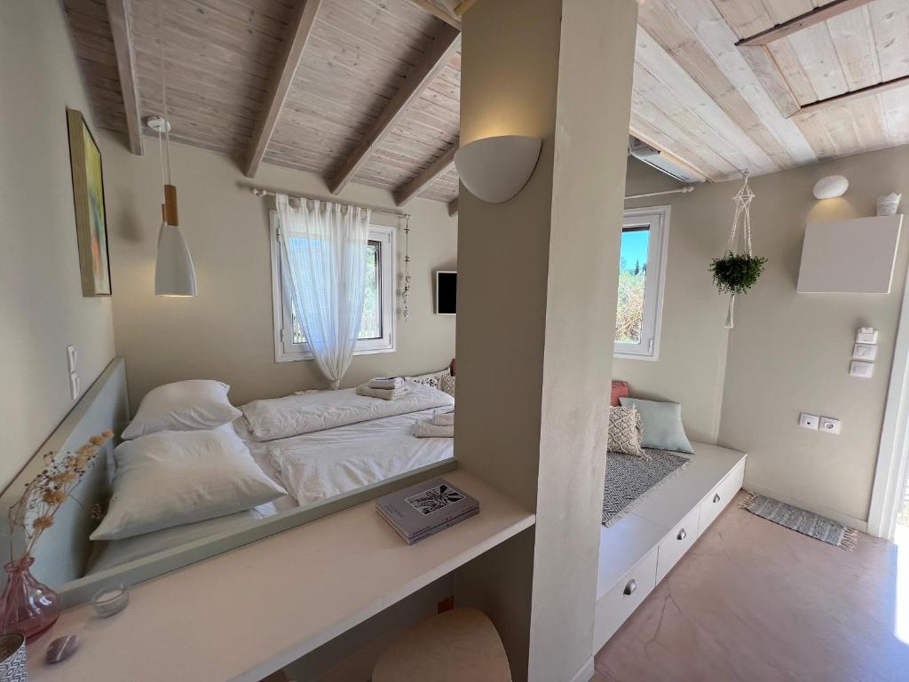 Postel nebo postele na pokoji v ubytování Kapella Apartments
