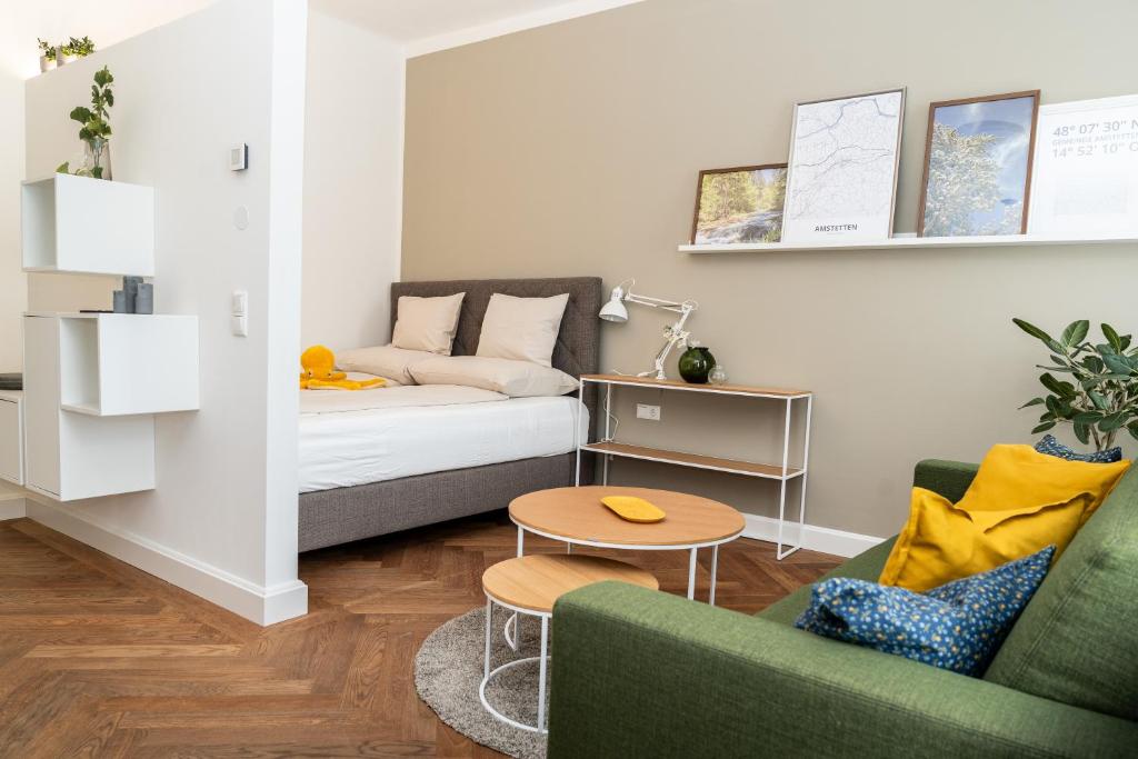 Postel nebo postele na pokoji v ubytování twenty five - work & life Apartments
