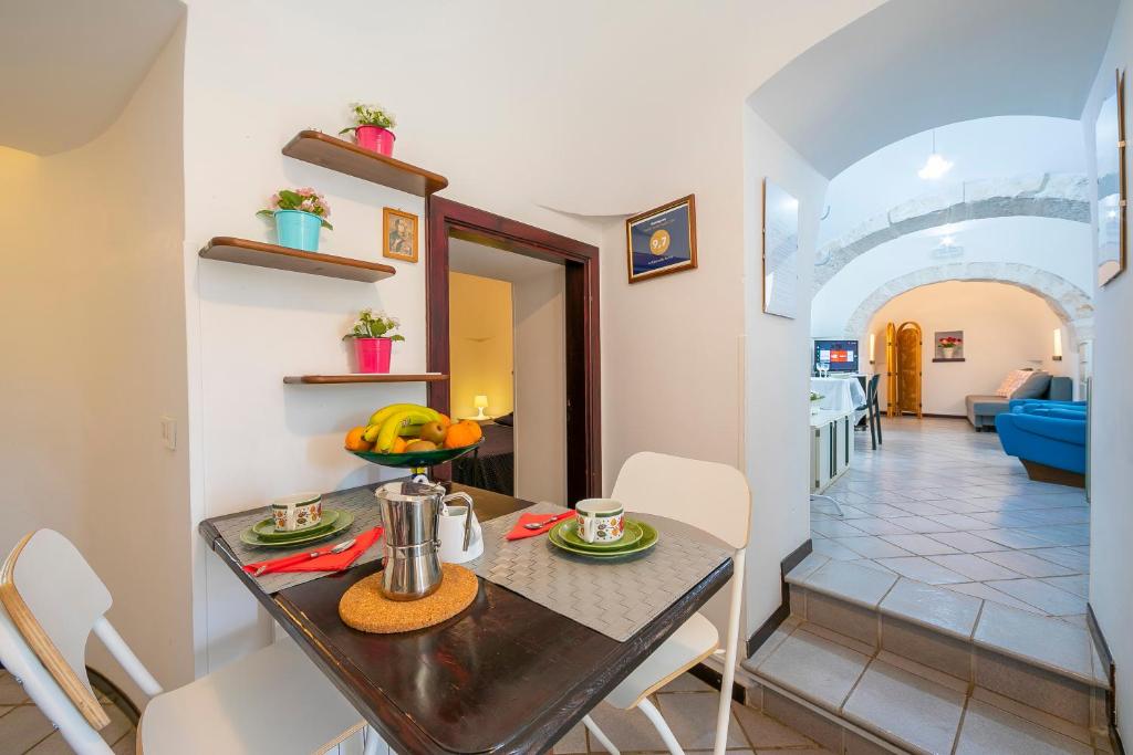 Część wypoczynkowa w obiekcie La Casa Sulla Roccia Trulli Pool - Happy Rentals