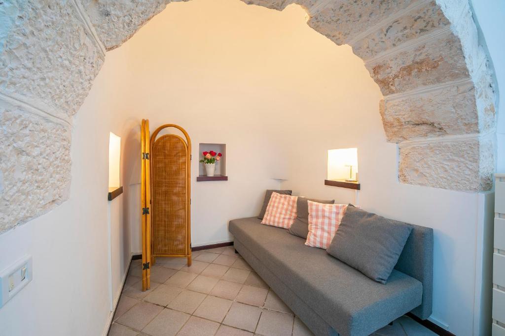 Część wypoczynkowa w obiekcie La Casa Sulla Roccia Trulli Pool - Happy Rentals