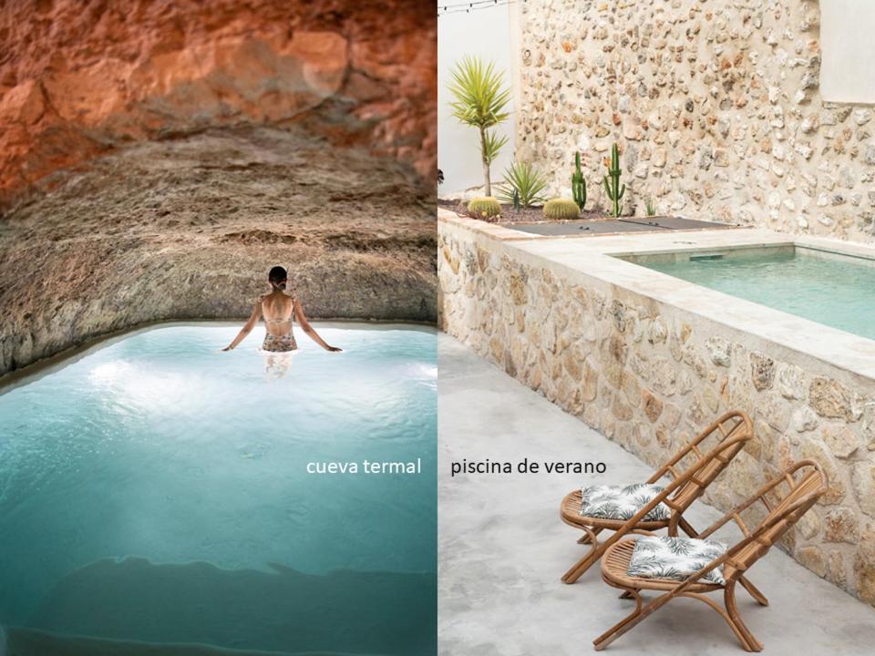 un uomo in piscina e una sedia in piscina di El Bálsamo - Hotel Boutique 5 Estrellas a Belmonte