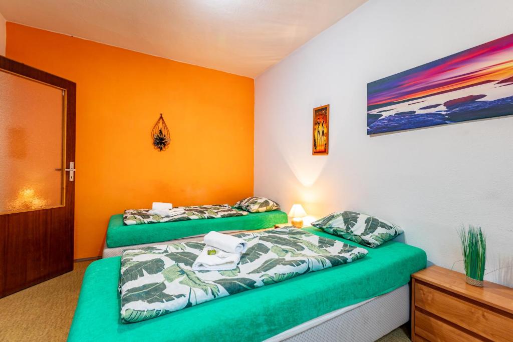 Postel nebo postele na pokoji v ubytování Country Saloon