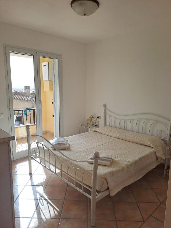 Postel nebo postele na pokoji v ubytování ALICE B&B
