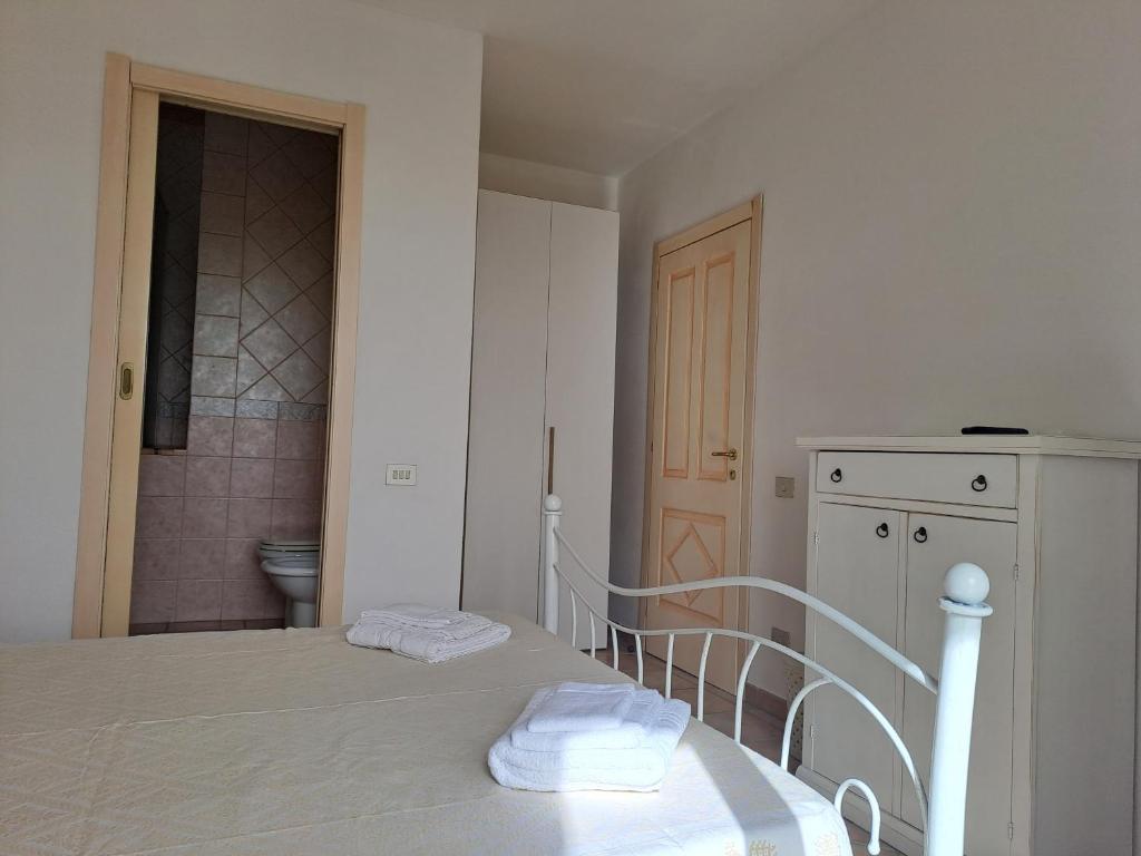 Postel nebo postele na pokoji v ubytování ALICE B&B