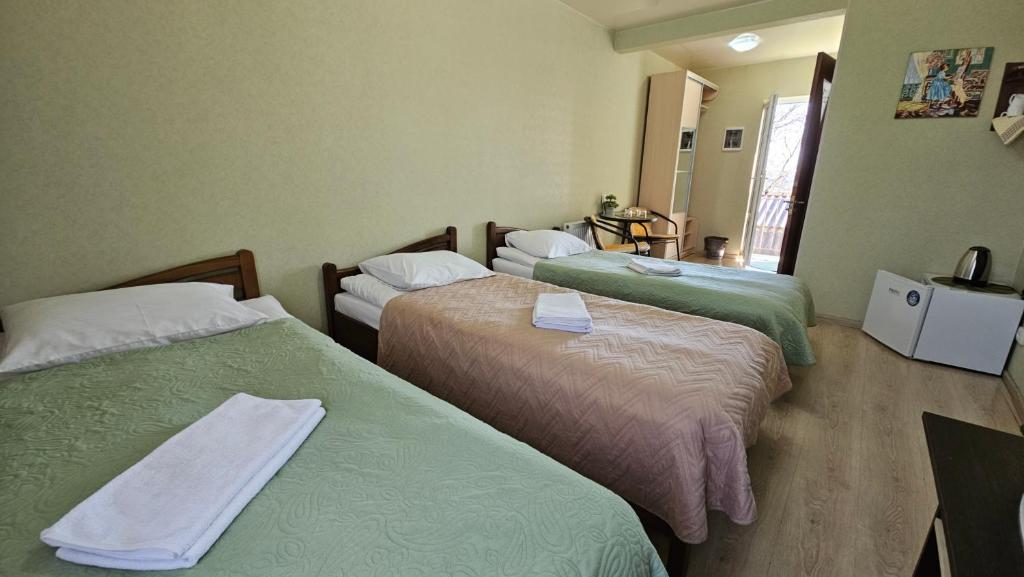 Postel nebo postele na pokoji v ubytování Domashniy