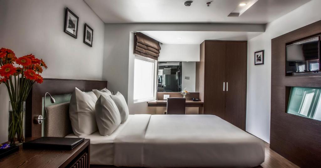 Postel nebo postele na pokoji v ubytování Ocean View Nha Trang