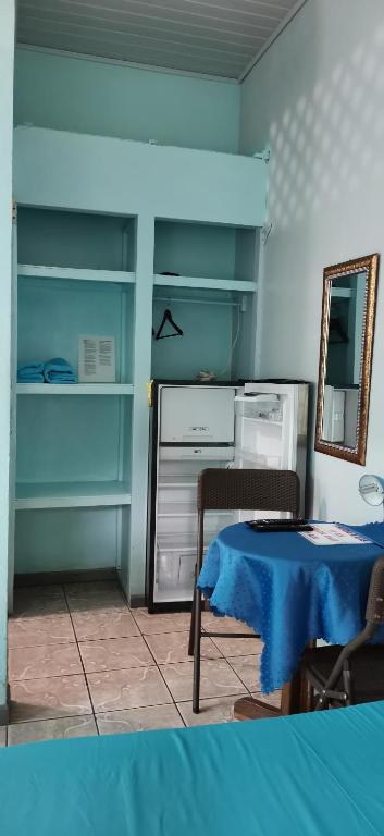 Кровать или кровати в номере Cabinas Mitchaelle's