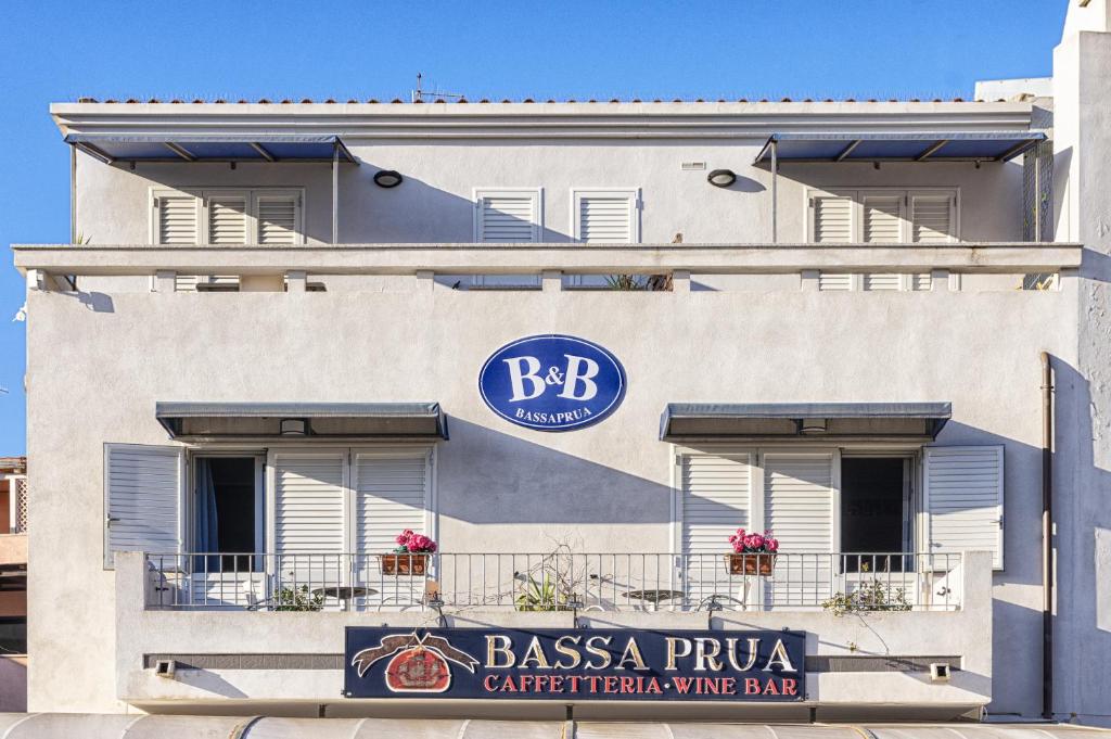 a building with a bbc sign on the side of it at Bassa Prua in Palau