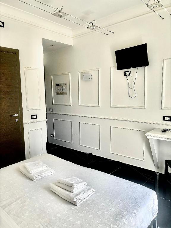 Cama o camas de una habitación en Palace Rome