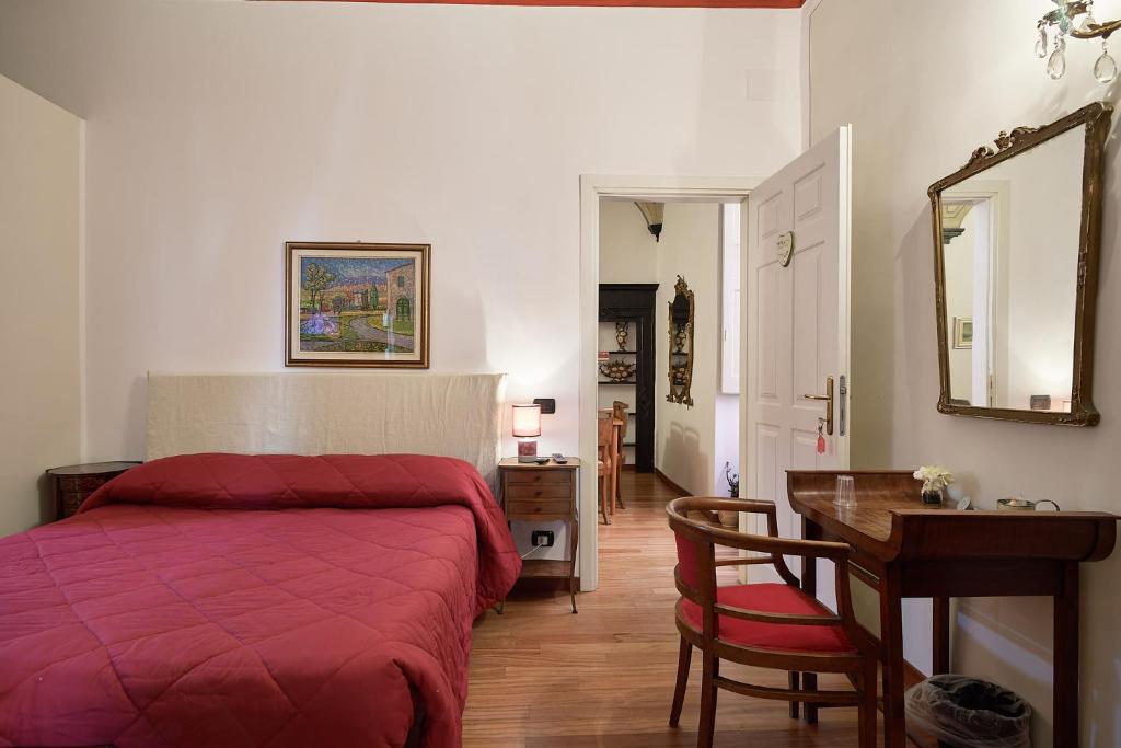 A bed or beds in a room at Affittacamere San Teodoro