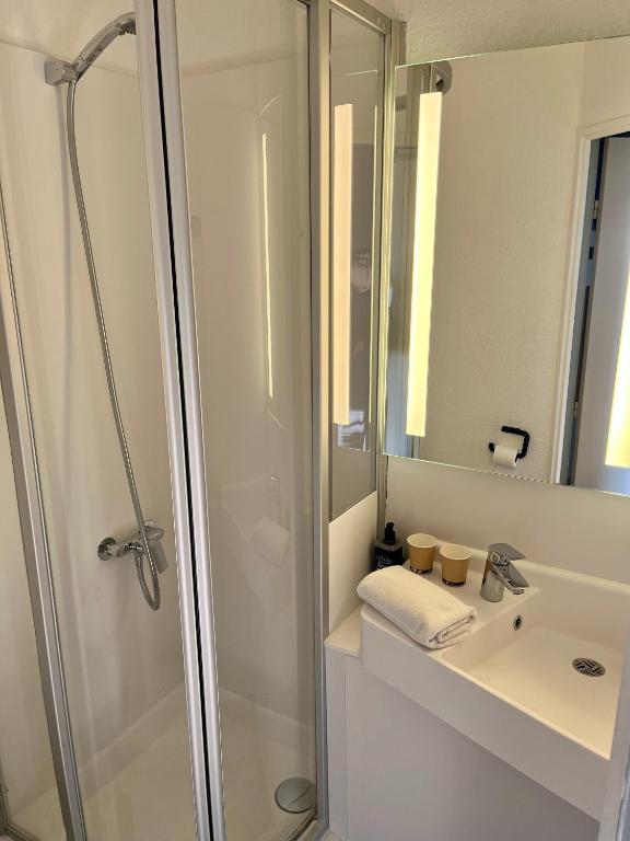 Koupelna v ubytování ibis budget Arles Sud Fourchon