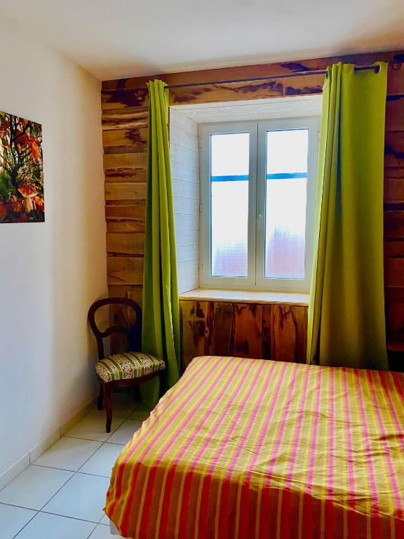 Postel nebo postele na pokoji v ubytování Gîte Béthel