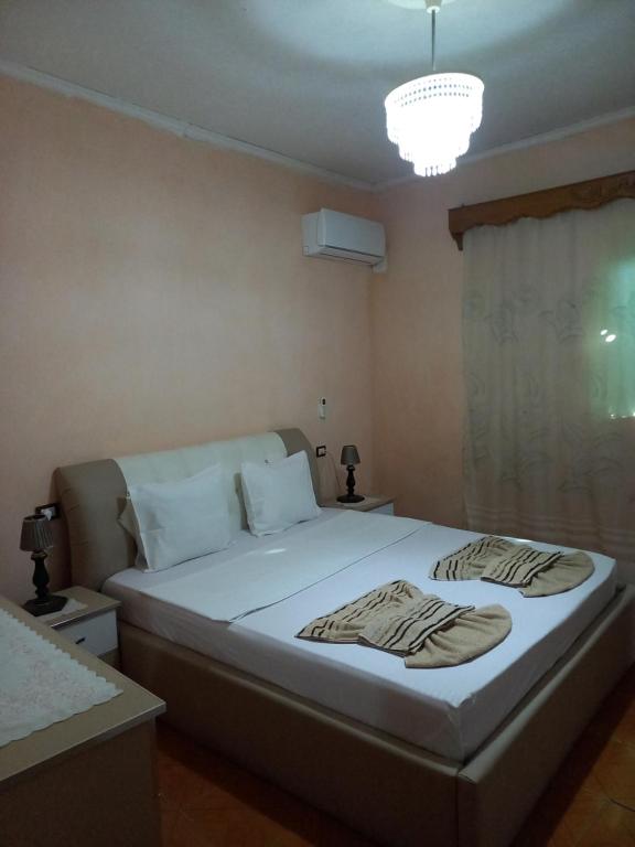 Letto o letti in una camera di MiziriGuestHouse