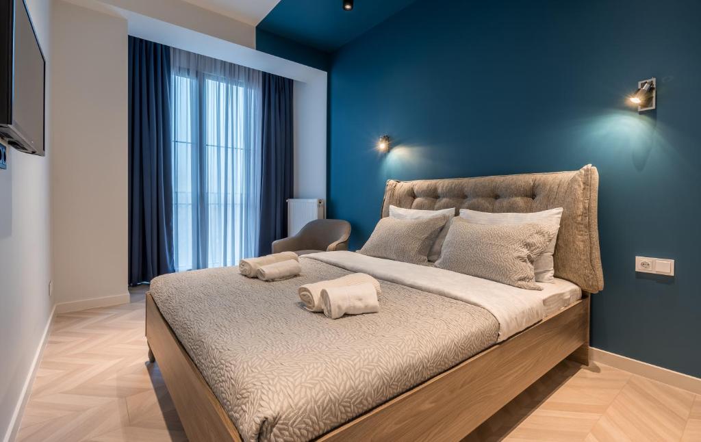 Postel nebo postele na pokoji v ubytování New Gudauri Apartments