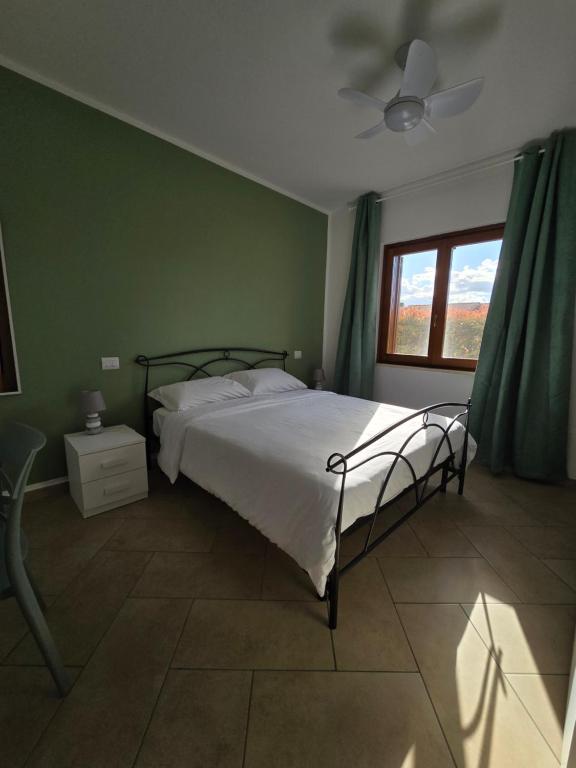 Postel nebo postele na pokoji v ubytování Casa Achille