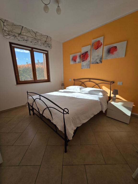 Postel nebo postele na pokoji v ubytování Casa Achille
